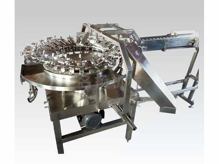Rotary egg breaking machine